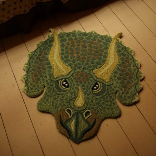 Grønt dino tæppe